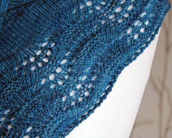 A close up on the rippling lace and textured border