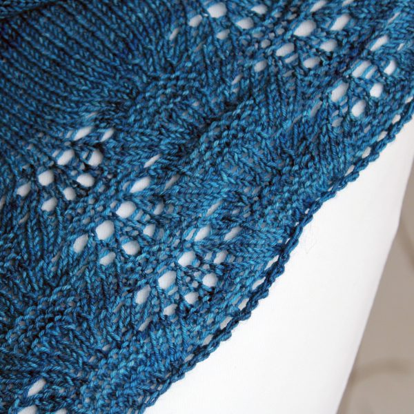 A close up on the rippling lace and textured border