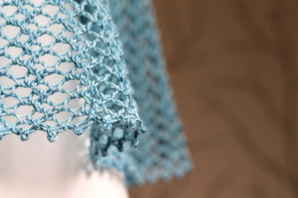 A close up on the lace and picot cast-off