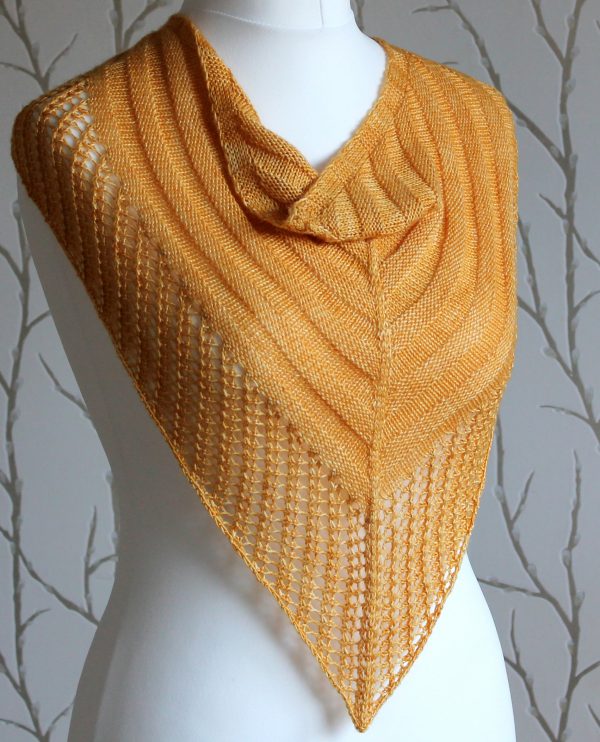 A yellow cowl with a ribbed body and wide lace border