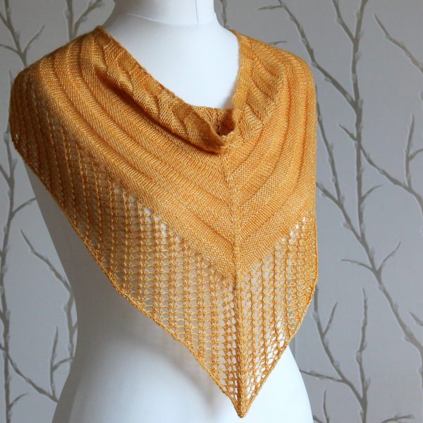 A yellow cowl with a ribbed body and wide lace border