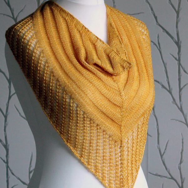 A yellow cowl with a ribbed body and wide lace border