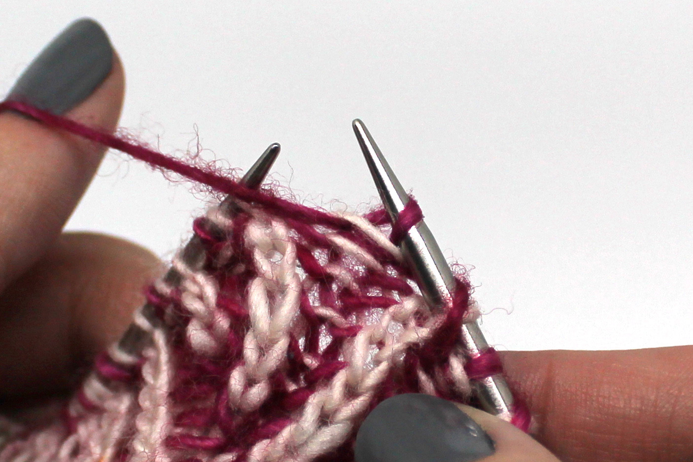 The completed brp stitch on the right hand needle