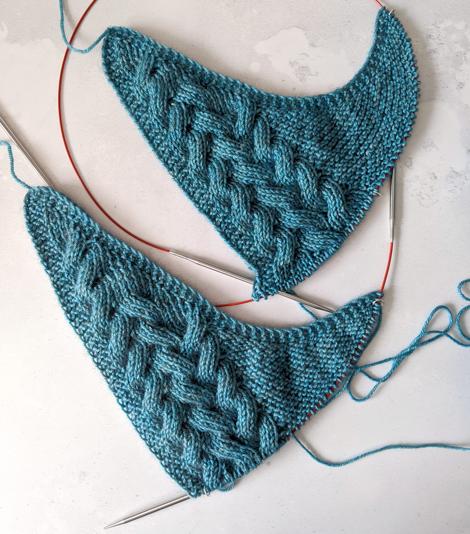 The cabled set up section of the same shawl with slightly different lengths