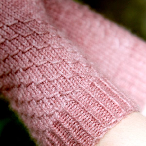 A close up of the textured pattern and the cuff