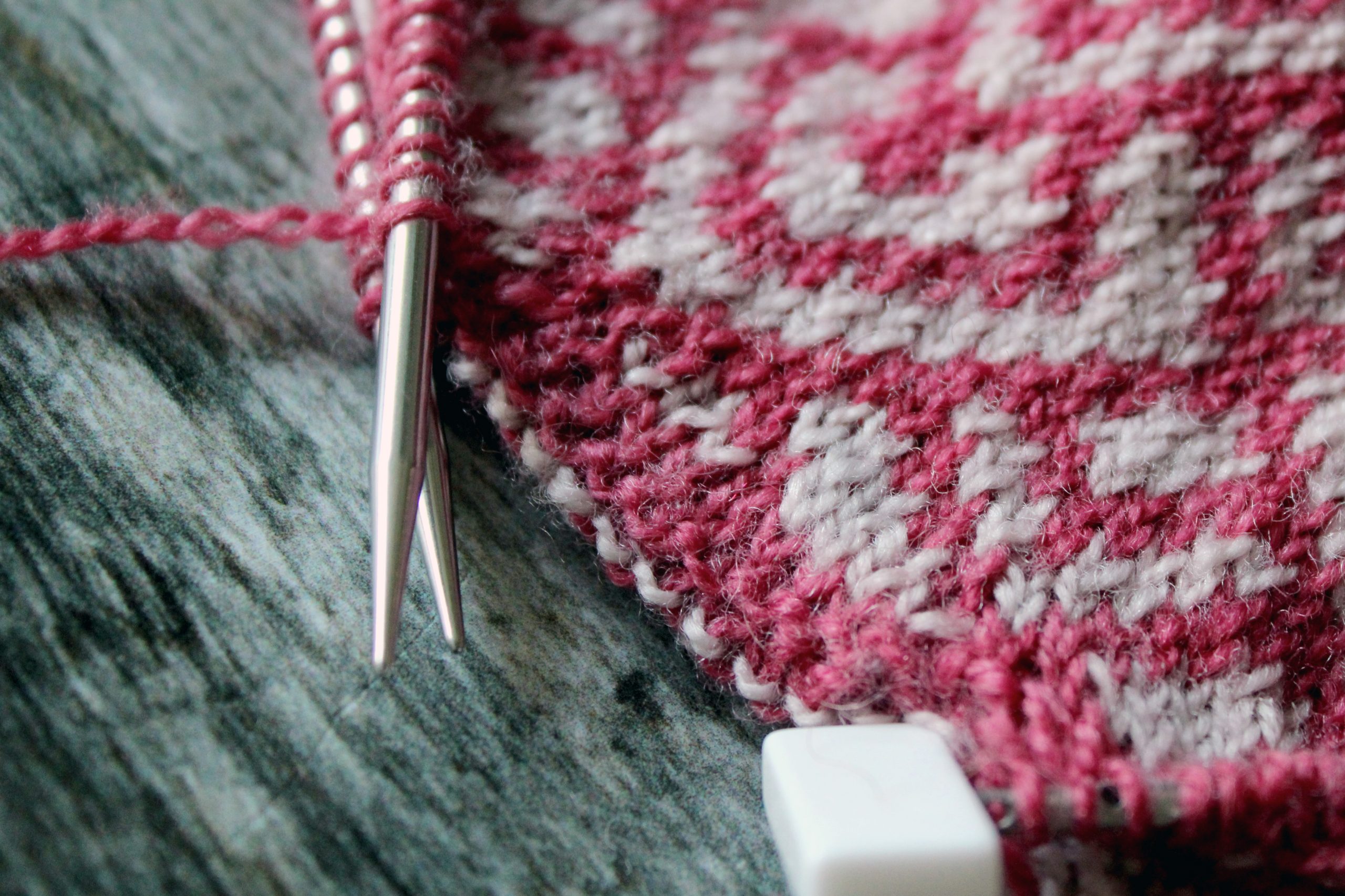 A piece of knitting with a purlwise graft in progress