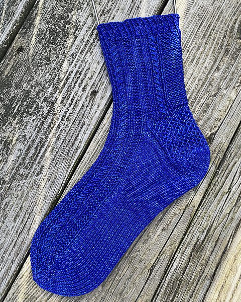 Christine knit her small Tìorail in Malabrigo Sock in Matisse Blue!