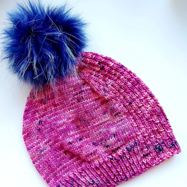 Wendy used Campfiber Yarns Plump 85 (dk weight 85 merino / 15 nylon) for her large adult hat