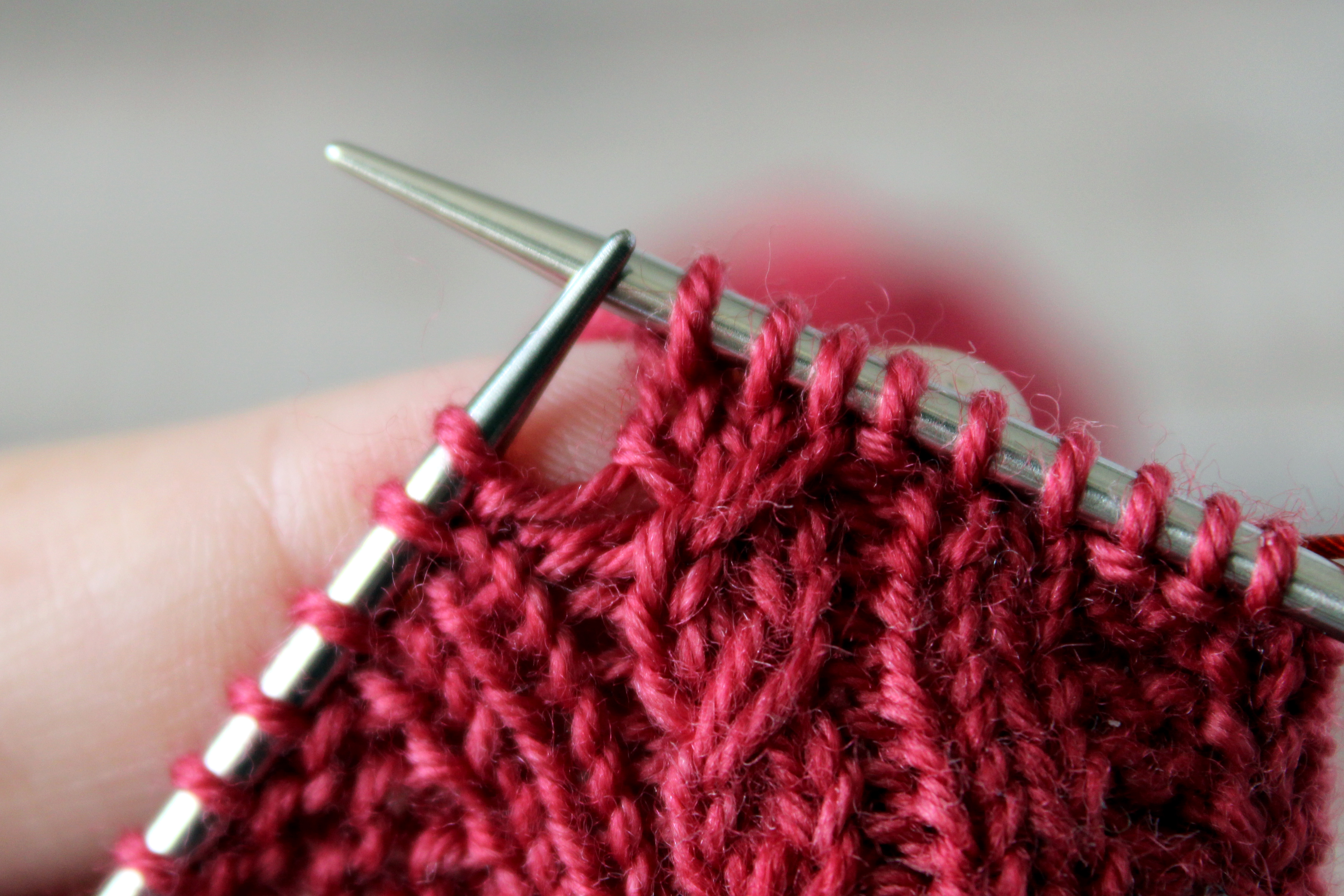 Knit the three stitches on to the right hand needle