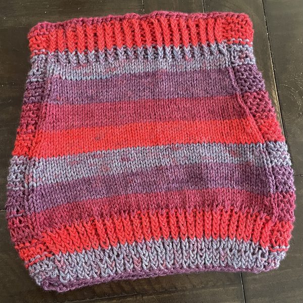 Dawn knit her child Pleuch in Loops and Threads Joy DK