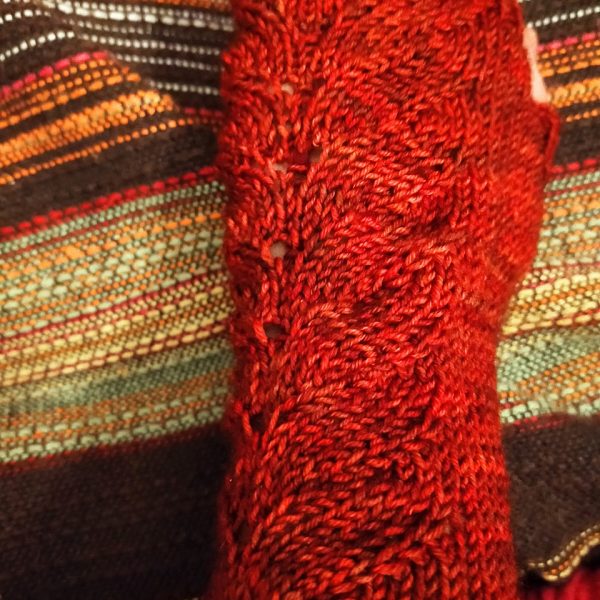 Giulia knit her size XS mitt in Madelinetosh Euro Sock in Cardinal