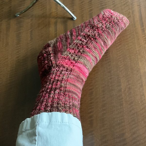 Blythe knit her large sock in Estelle Urth merino sock