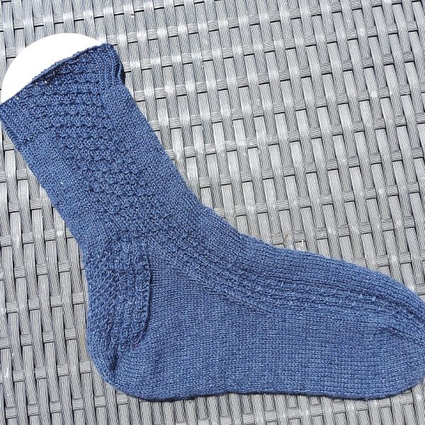 Iris knit her large socks in Drops Fabel
