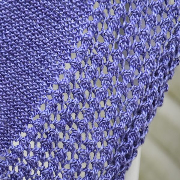 Jean knit her small Driùchdan in Expression fiber arts yarn in pearlescent fingering base. Single ply, (550yds/115g per skein. 50%merino/50%silk)