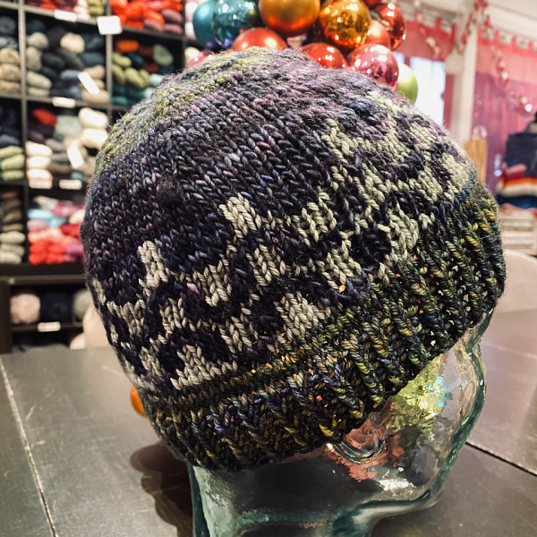 Cashman made his Child sized hat in Malabrigo Rios (Hojas, Cape Cod Gray) & Malabrigo Washted