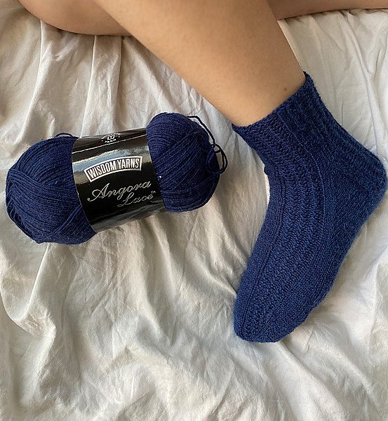 Askley knit her small sock in Wisdom Yarns Angora Lace 20% Angora