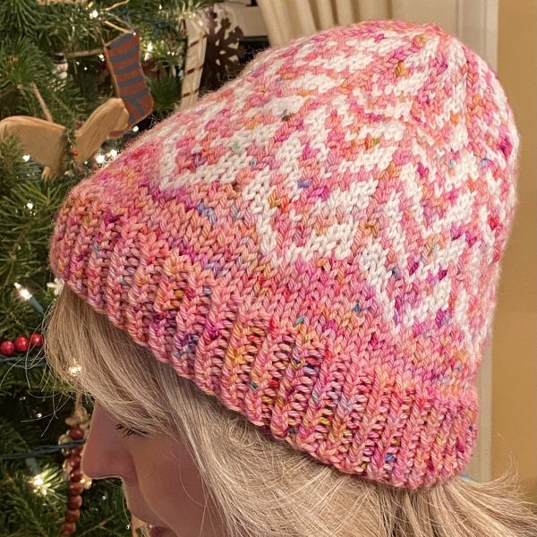 Deb knit her child Flist Hat in Cozy& Craft carnival candy worsted and swish DK in white