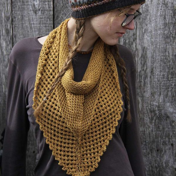 A cowlette with a textured body and lace border knit in yellow yarn